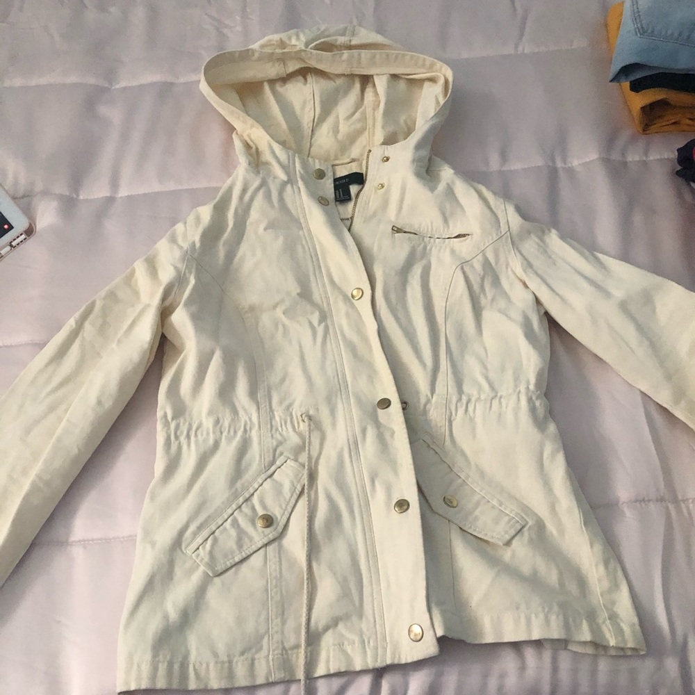 Tan jacket with gold accents